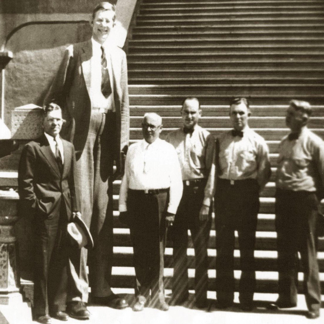 Robert Wadlow, the tallest human in history, visiting Folsom Prison in 1939 as a spokesman for the International Shoe Company.